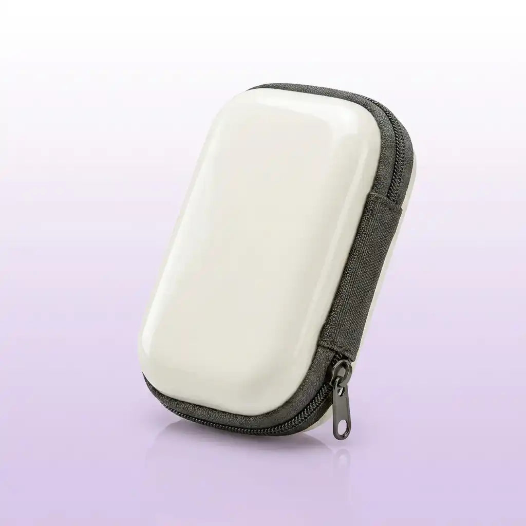 Pocket Retro travel case in cream white, closed, showing the zip and pull tab